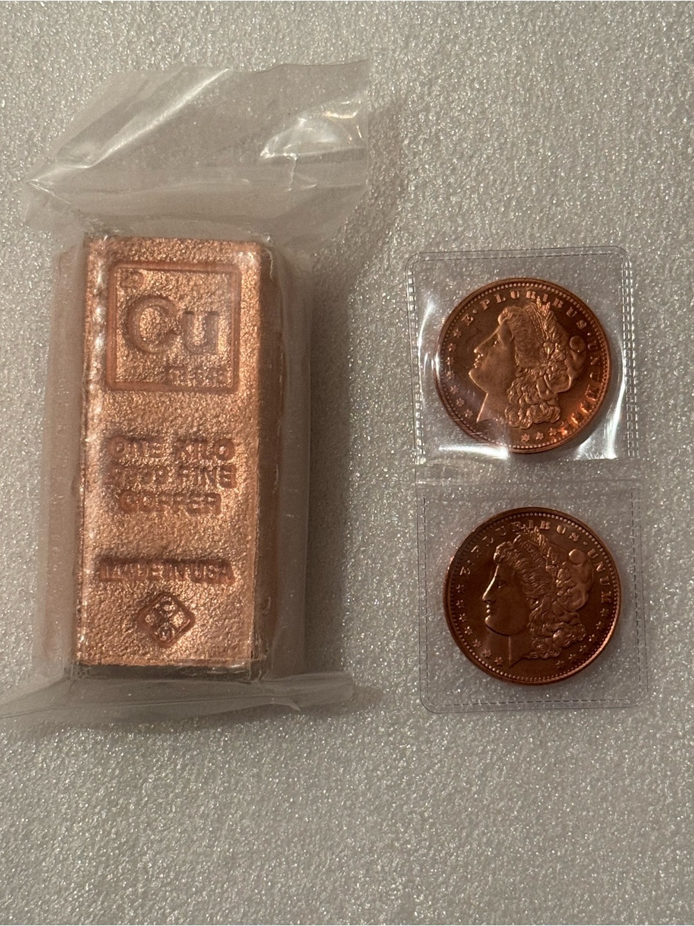 Copper. 1 Kilo Bar and 2 - One Ounce Morgan Style Rounds